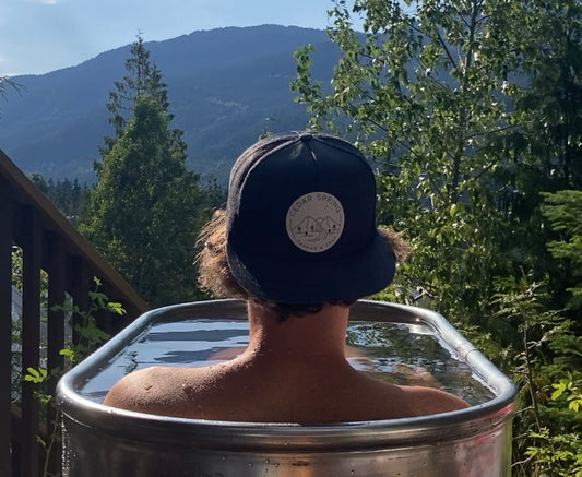 person in cedar spring recreation ice bath cold plunge